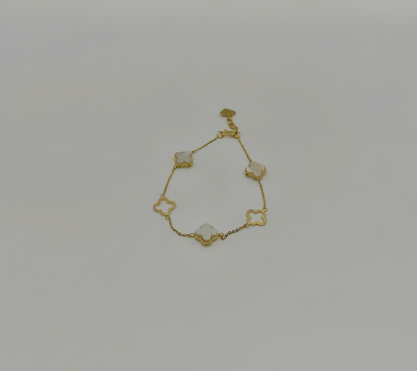 Lắc tay vàng 18k cỏ 4 lá 3 hột trắng